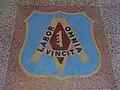 Labor omnia vincit - Emblème de United Brotherhood of Carpenters and Joiners of America.