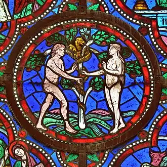 La tentation d'Adam et Ève, détail d'un vitrail de la chapelle de la Vierge.