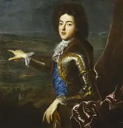 Jeune, en armure, en buste, de trois quarts. En arrière-plan, un lointain champ de bataille qu'il désigne du doigt.