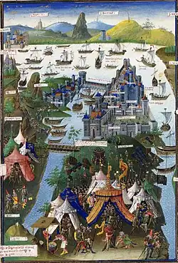 Photographie d'un manuscrit représentant une ville assiégée.