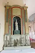Le retable latéral gauche de la nef.