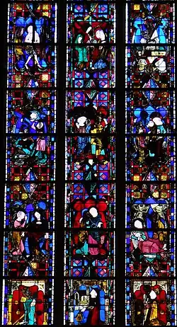Verrière de la vie du Christ datant du XIVe siècle, avec les donateurs.