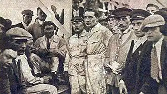 Les trois pilotes Delage vainqueurs du Grand Prix de Saint-Sébastien en 1925 (G. à D. Divo (1), Thomas (3) et Benoist (2), puis Louis Delâge). Les mines sont tristes malgré leur triplé, car le quatrième de l'équipe, Paul Torchy, est mort durant l'épreuve.