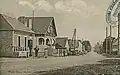Liffré ː la Rue de Rennes vers 1920 (carte postale).