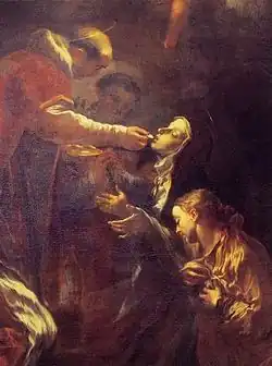 Tableau représentant un saint auréolé et chauve, donnant la communion à Thérèse agenouillée.