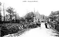 Lizio ː une rue du bourg au début du XXe&nbsp;siècle (carte postale Vasselier).