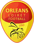 Logo en forme d’œuf majoritairement jaune avec une forme arrondie sur la moitié haute.