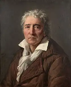 Portrait d'homme en veste brune et écharpe blanche