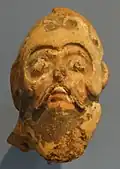 Tête de guerrier (A)