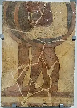 Motifs de guerrier peints sur plaque de grès issue d'un vestige d'habitat de la cité de « Cisra ».