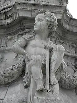 Un des putti.