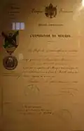 Certificat de la distinction.