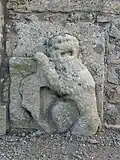 Bas relief de l'entrée du cimetière.