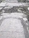 Pavement de pières tombales vestiges de la réalisation du film La Liste de Schindler