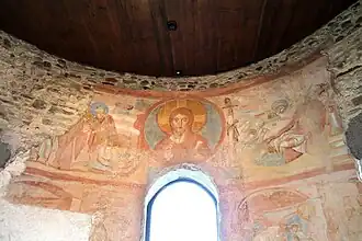 Le christ en majesté entouré de scènes bibliques.