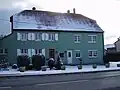 Exemple de maison à Schopp rénovée avec appartement dans l'ancienne travée grange-étable, à Danne-et-Quatre-Vents, Lorraine.