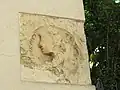 Détail du mur du portail d'entrée.