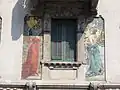 Casa Galimberti, figures sur la façade sur via Malpighi