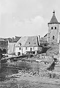 Marcolès au tout début du XXe&nbsp;siècle. Vue sur le bourg  et la porte-basse