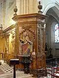 Boiseries devant le pilier sud-est de la croisée ; statue de saint Martin.