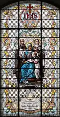 Vitrail de sainte Anne et de la Vierge Marie avec sainte Thérèse et saint Ignace de Loyola.