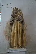 Marie tenant l'enfant Jésus.