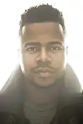 Marque Richardson interprète Reggie.