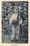 Un homme de la tribu Shala; carte postale d'après une photographie de Marubi.