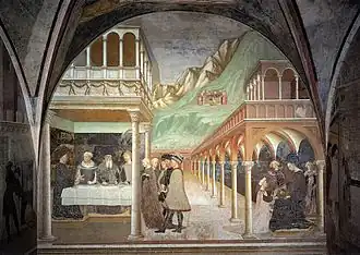 Image d'une peinture montrant sous un grand arc, à gauche un banquet, avec Hérode en tête de table et trois invités et devant eux, debout plusieurs dignitaires. Au-dessus, au-delà d'une frise d'angelots et de festons, se trouve une petite loggia avec des arcs. À droite, sous un très long portique avec des colonnes et des arcs en plein cintre se déroule la scène de la remise par Salomé à Hérodiade de la tête de Saint Jean-Baptiste. En arrière-plan, se trouve un paysage montagneux avec au loin l'enterrement du Baptiste.