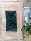 Détail d'une fenêtre en fer forgé