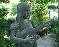 Ange à la guitare au-dessus de la tombe de Max Unger au cimetière de Dahlem (Berlin)
