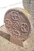 Stèle discoïdale du cimetière de Gréciette