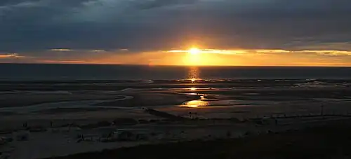 Coucher de soleil sur la plage de Merlimont.