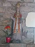 Statue de Saint Cornély, XVIIIe&nbsp;siècle, chapelle Sainte-Catherine, réalisée par Ollivier Cadic, maître menuisier sculpteur à Guiscriff.