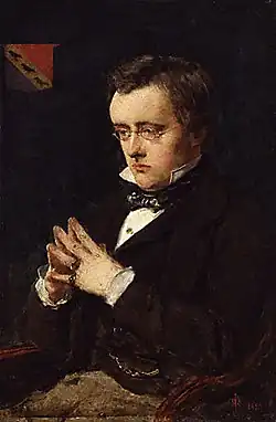 Tableau. Collins, romancier ami de Dickens, maître du roman à sensation, visage assez plat, mains jointes, environ 40 ans, regard songeur