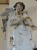 Ange (gauche).