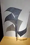 Monnaie en forme de couteau de jet (oshele).