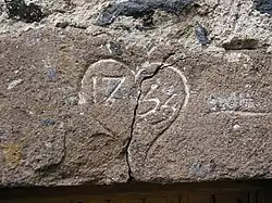 Linteau de la maison de la béate de Civeyrac à Loudes.
