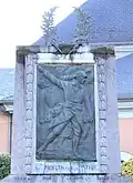 La sculpture.