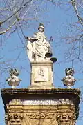 Thémis, Louis XVI et le cartouche supérieur