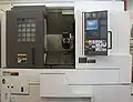 Tour à commandes numériques.