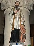 Statue de Saint François Xavier baptisant.