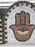 Main de Fatima, détail d'une mosaïque contemporaine (XXIe siècle, El Jem).