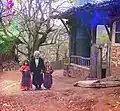 Mollah avec deux élèves, vers 1910