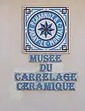 Enseigne du musée.