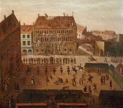 Peinture d'un grand bâtiment dans lequel des hommes jettent des feuilles de papier par les fenêtres ou retirent les tuiles du toit, devant une foule qui observe la scène depuis une place en contrebas.