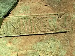 Marque sur une brique d'un hypocauste.