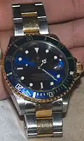 Rolex Submariner deux tons or/métal.