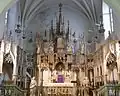 Retable, autel, baldaquin.