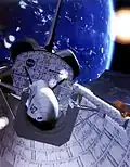 Le X-37A dans la soute de la navette, moyen de lancement envisagé initialement.